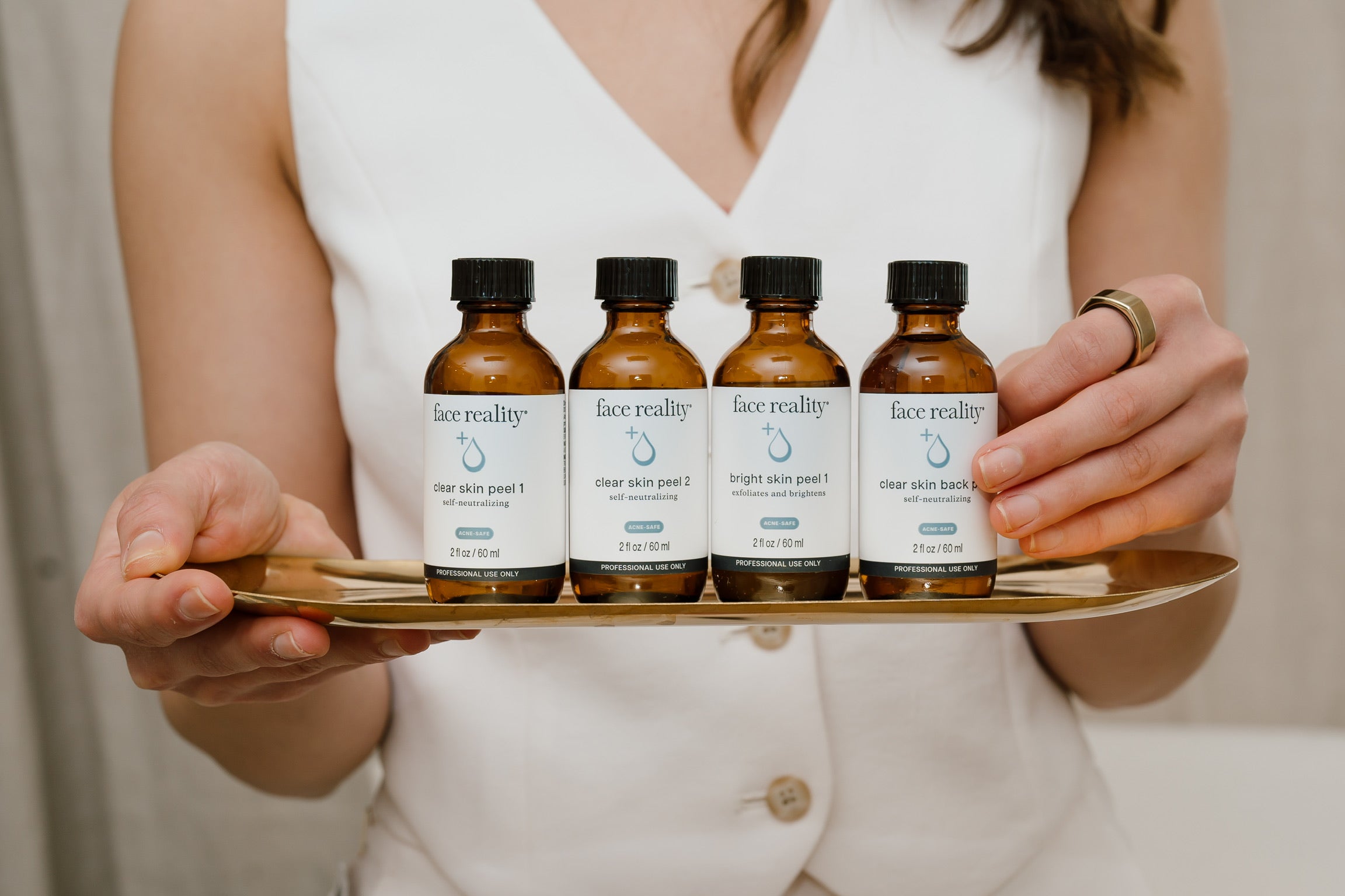 Face Reality chemical peel treatments lined up on a platter.